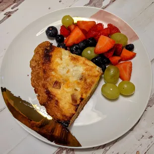 The quiche was a bit of a disappointment, specifically the crust. The accompanying salad (grapes, strawberries, blueberries) was fantastic.