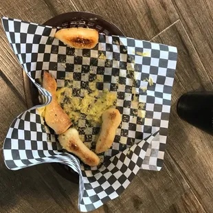 Apparently this is the amount of complimentary breadsticks you get now... it used to be actual breadsticks now it's just scraps.