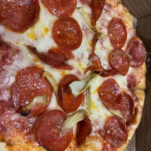 Asked for artichoke hearts and received bits of artichoke leaves on 1 slice of pizza