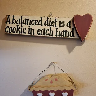 a balanced diet is a cookie in each hand