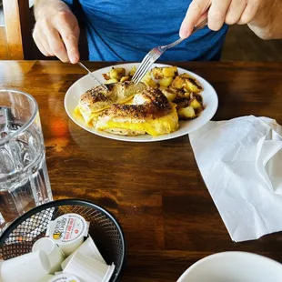 a man eating a plate of food