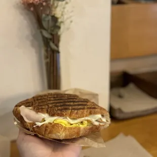 Croissant with turkey, egg, and cheese