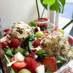 a salad in a plastic container