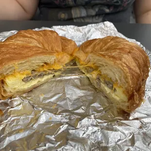 Eggs, sausage, and cheese on a croissant