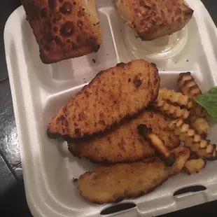 Burnt fries, toast, and chickens finger. I was oh it got left in the oven to long