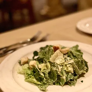 a plate of salad on a table