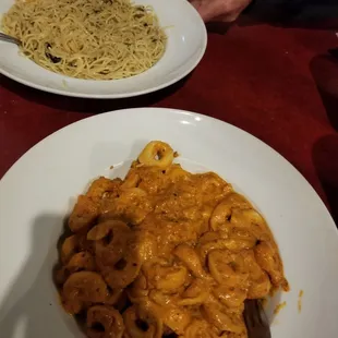 Tortellini bolognese and garlic butter spaghetti.