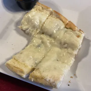 Dinner time. Starting with garlic bread which is delicious!