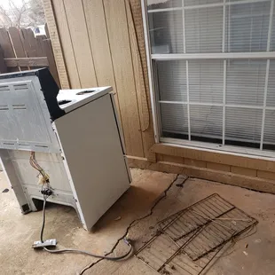 The oven that&apos;s on my porch right now, there was a fridge too but they finally moved the fridge.