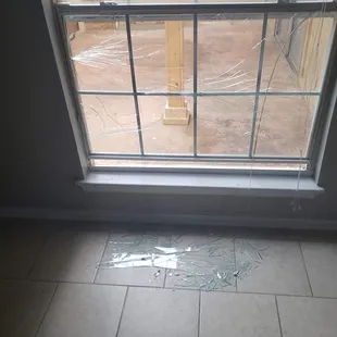 Broken window that was never fixed Tuscany Village