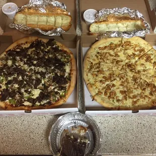 Philly pizza, chicken Alfredo and bread sticks. Yummmmmm.