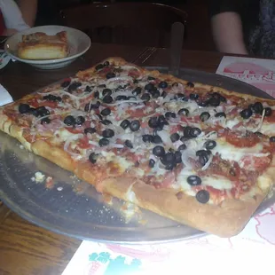 A "supreme" pizza. 12 cuts.