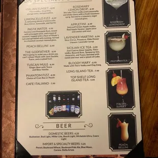 a menu for drinks on a table