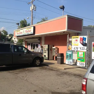a truck parked in front of a gas station