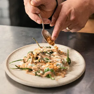 a person eating a plate of food