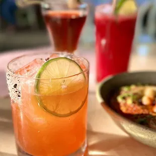 a close up of a drink and a plate of food