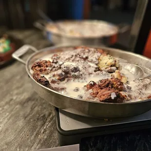 a pan of food on a scale