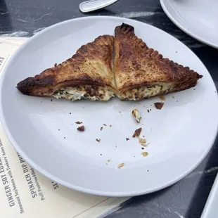 Spinach dip puffs half eaten