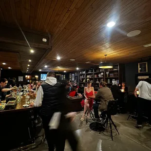 people sitting at the bar