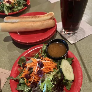 a salad and a hot dog