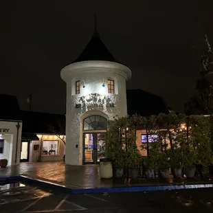 the outside of a building at night