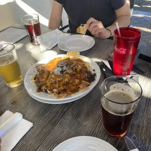Nachos with short rib as protein. It was good! We asked for extra salsa/sauce.