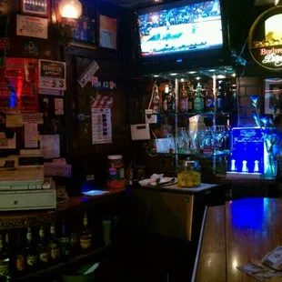 a bar with a television in the background