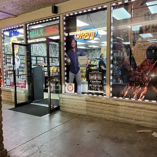 a man standing in front of a store