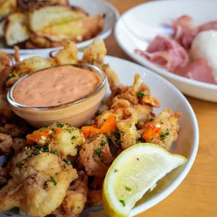 Crispy Calamari: northwest calamari, house-made pickled pepper, calabrian chile aioli ($11.50).