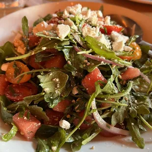 a closeup of a salad on a plate