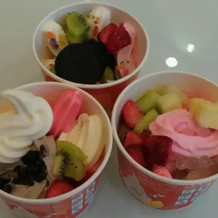 three cups of ice cream and fruit