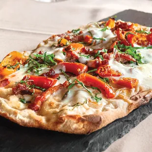 Rotating Special of the Day
(Guanciale Pizza Pictured)