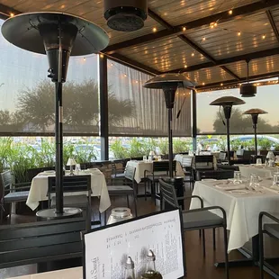 a restaurant with tables and chairs