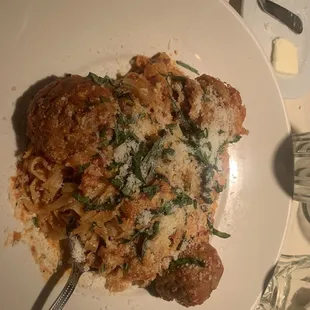 Fresh pasta with homemade meatballs and red sauce