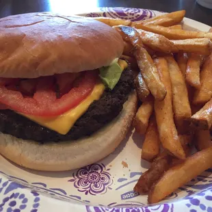 a hamburger and fries on a plate