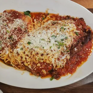 Eggplant parmigiana served with angel hair