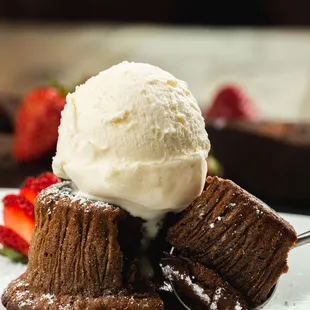 Soffiato di Cioccolato: 
Warm flour-less cake with molten chocolate center served with vanilla ice cream