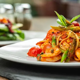 Spaghetti with Shrimp, Asparagus, Cherry Tomato and garlic in a light tomato sauce Special