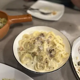 a close up of a plate of pasta