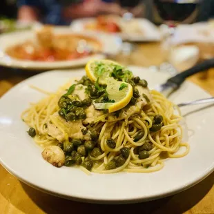 Chicken Piccata: The BEST I have ever had. The XL Italian salt preserved capers over spegetti make it. Winners Circle :)..