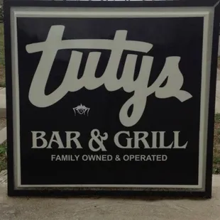 a sign for tuty's