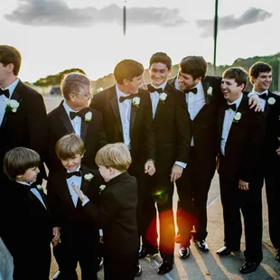 Check out our tuxedos in action! We love working with wedding couples. Photo by: http://unveiledradianceph­otography.com