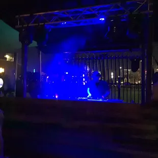 a stage with a band playing