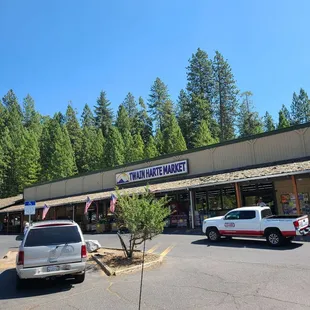 cars parked in front of the store