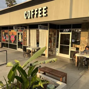 Outdoor seating, patio, front of store