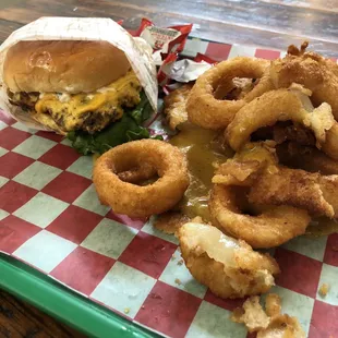 Burger and onion rings.  Prior to catastrophic bun implosion