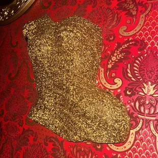 a gold stocking on a red background