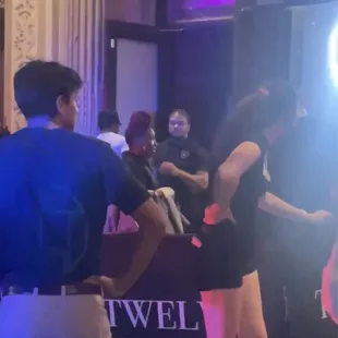 Female security guard that kicked out a lady for defending a woman who was assaulted multiple times by different male security guards.