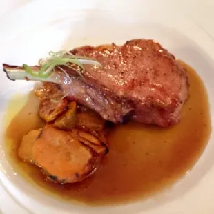 Stuffed pork chop with sweet potato terrine.