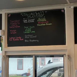 a menu on the wall of a restaurant
